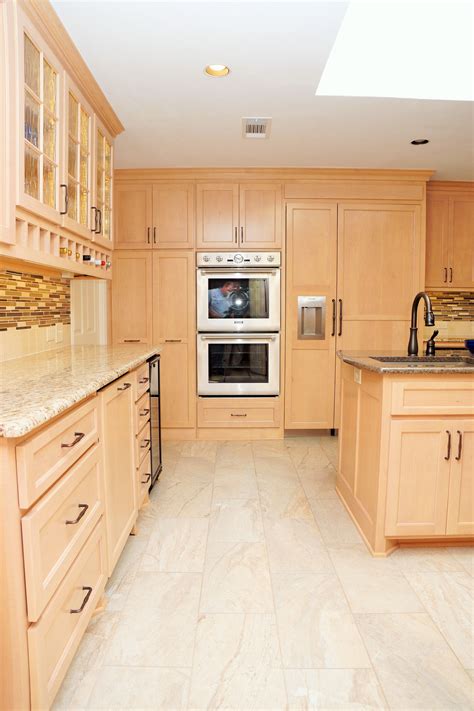 light maple kitchen cabinets with stainless steel appliances|maple cabinets with white countertops.